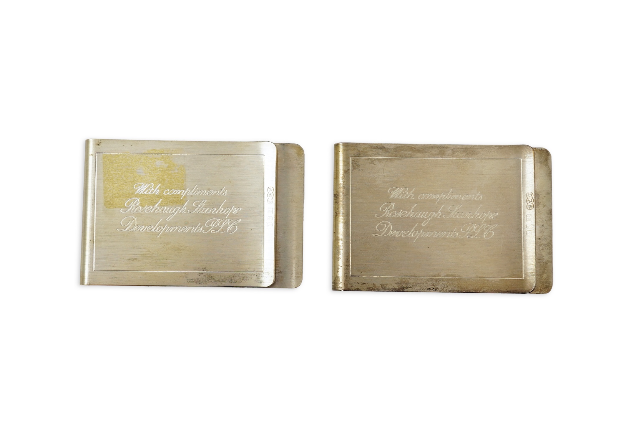 A pair of Elizabeth II silver money clips by Adrian Gerald Benney